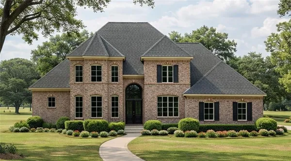 a front view of a house with garden