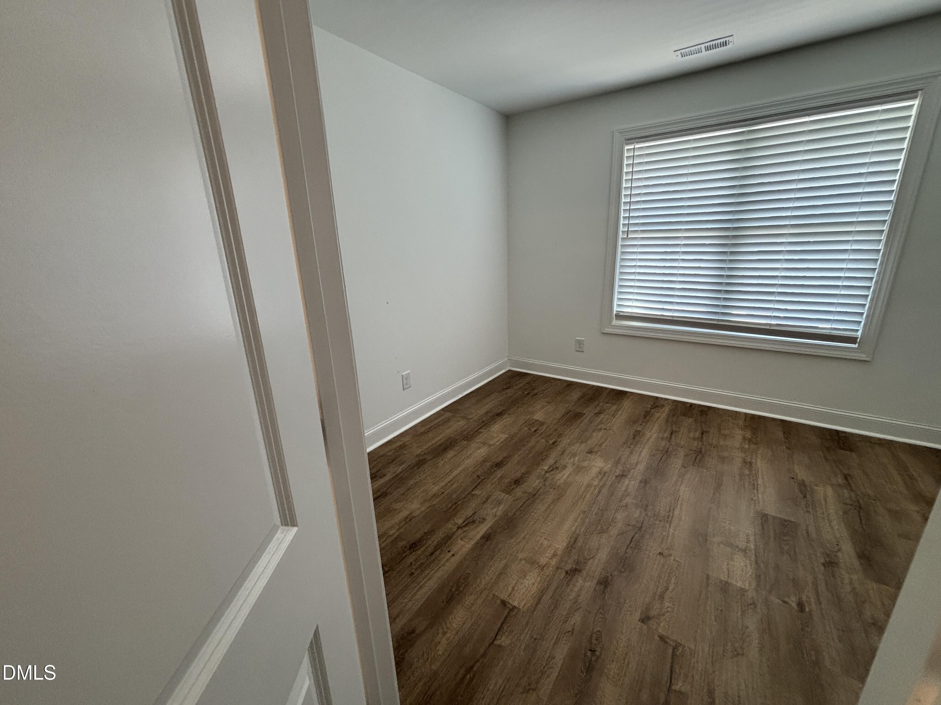 5710 Parker Pnes Court Raleigh, NC 27609 - Photo 59 of 78 a view of a room that has a window in it