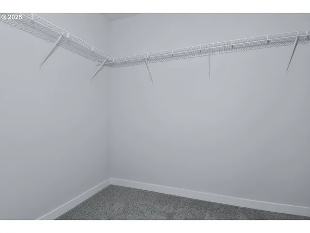 a view of a room with racks on the wall