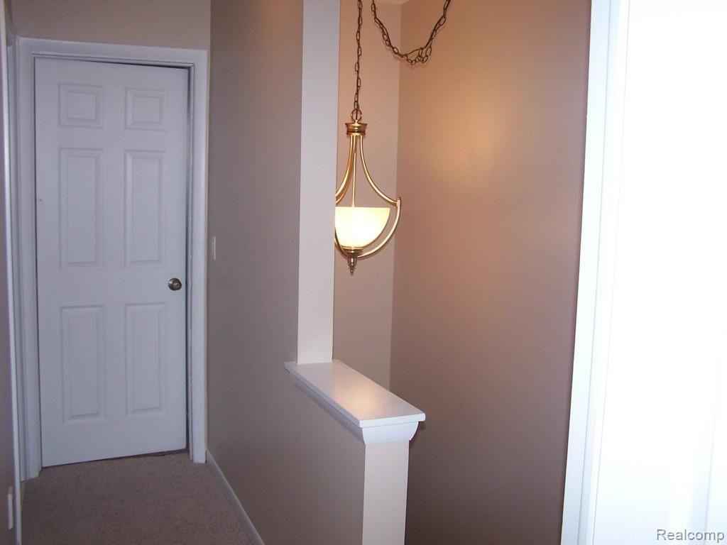 9039 East Lake Road Clarkston, MI 48348 - Photo 16 of 23 Upstairs Hall