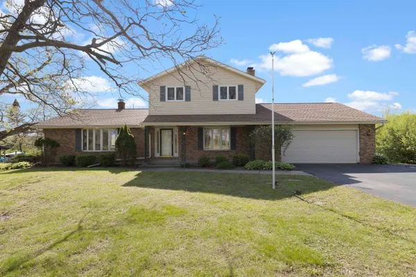 a view of a yard in front of house
