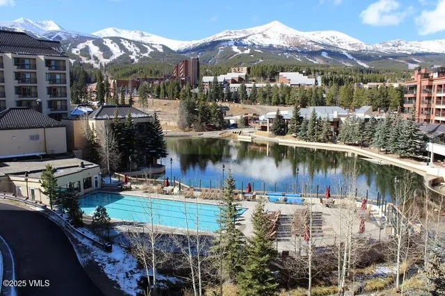 a view of a lake with a house
