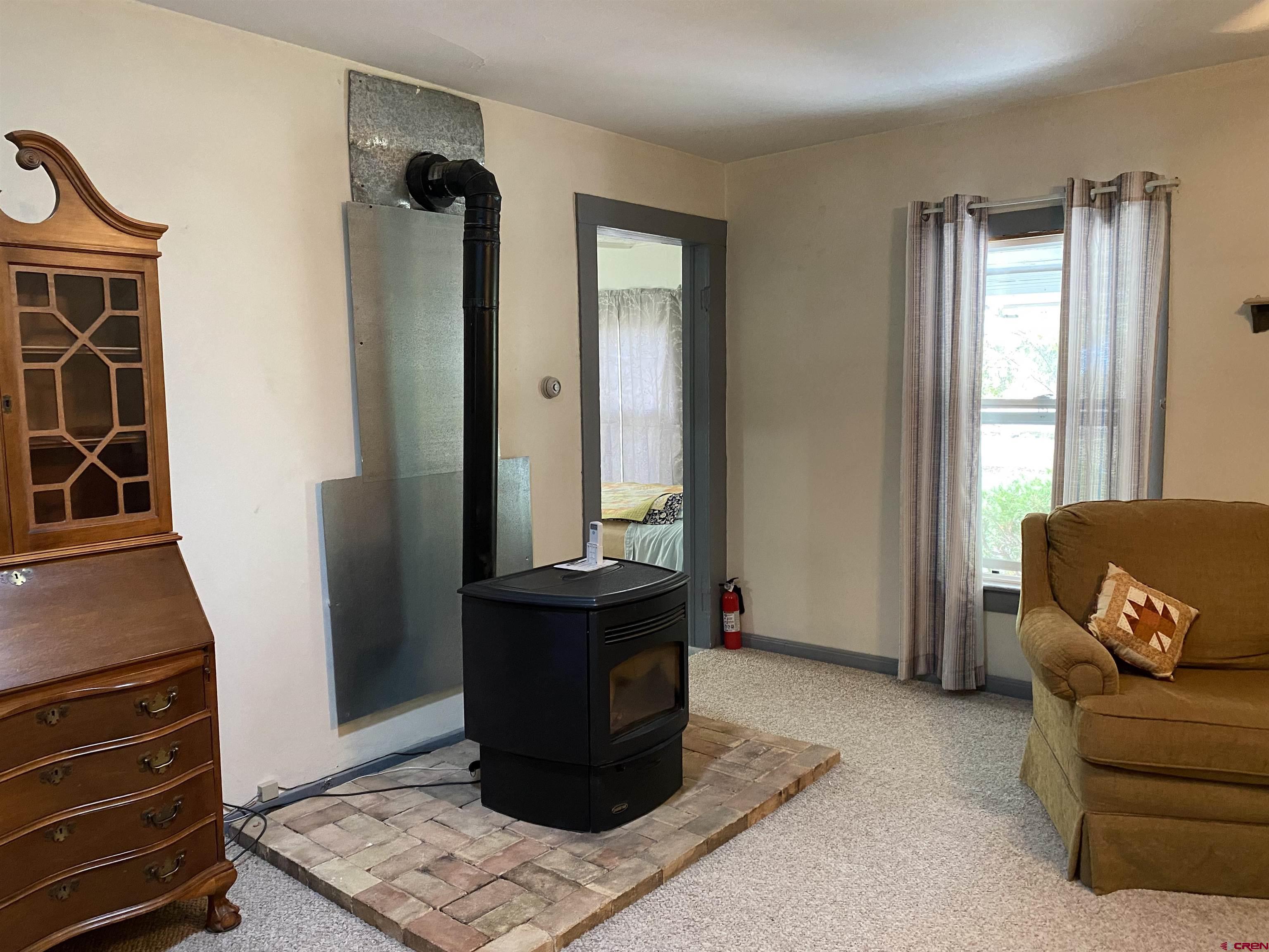 21236 Lanning Road Austin, CO 81410 - Photo 7 of 21 a living room with furniture and a window