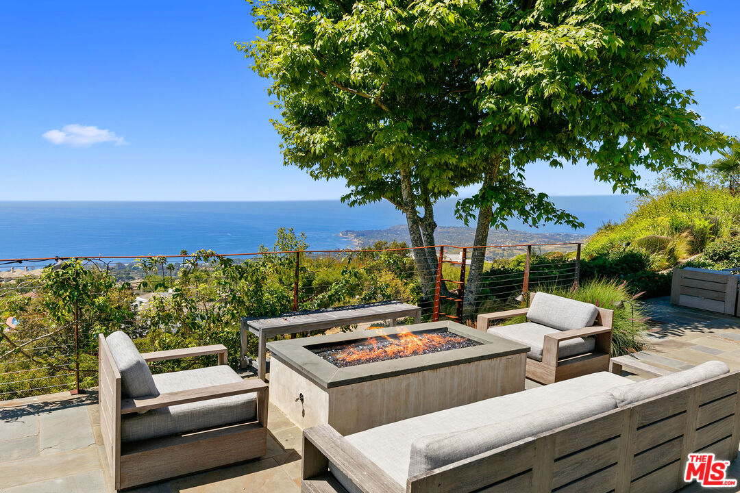 27450 Calicut Road Malibu, CA 90265 - Photo 14 of 59 a view of a patio with swimming pool