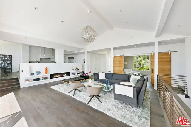a kitchen with counter top space and sink