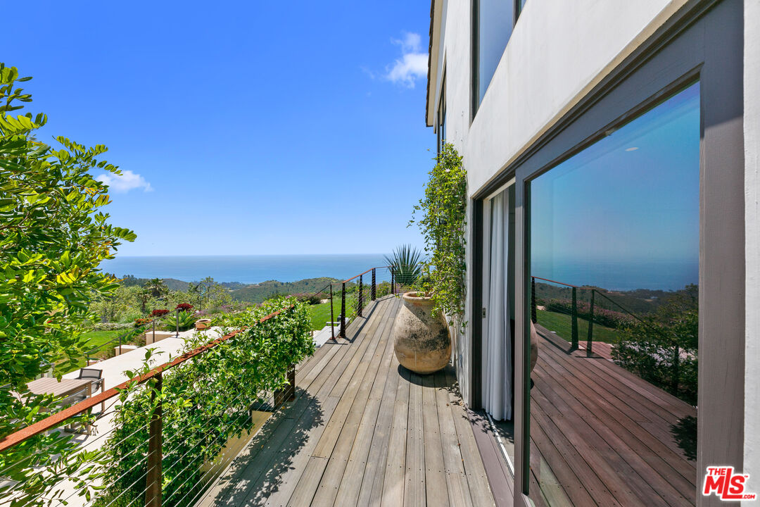 27450 Calicut Road Malibu, CA 90265 - Photo 47 of 59 a view of a balcony with wooden floor