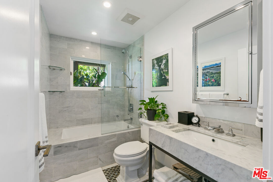 27450 Calicut Road Malibu, CA 90265 - Photo 52 of 59 a bathroom with a sink a toilet and shower
