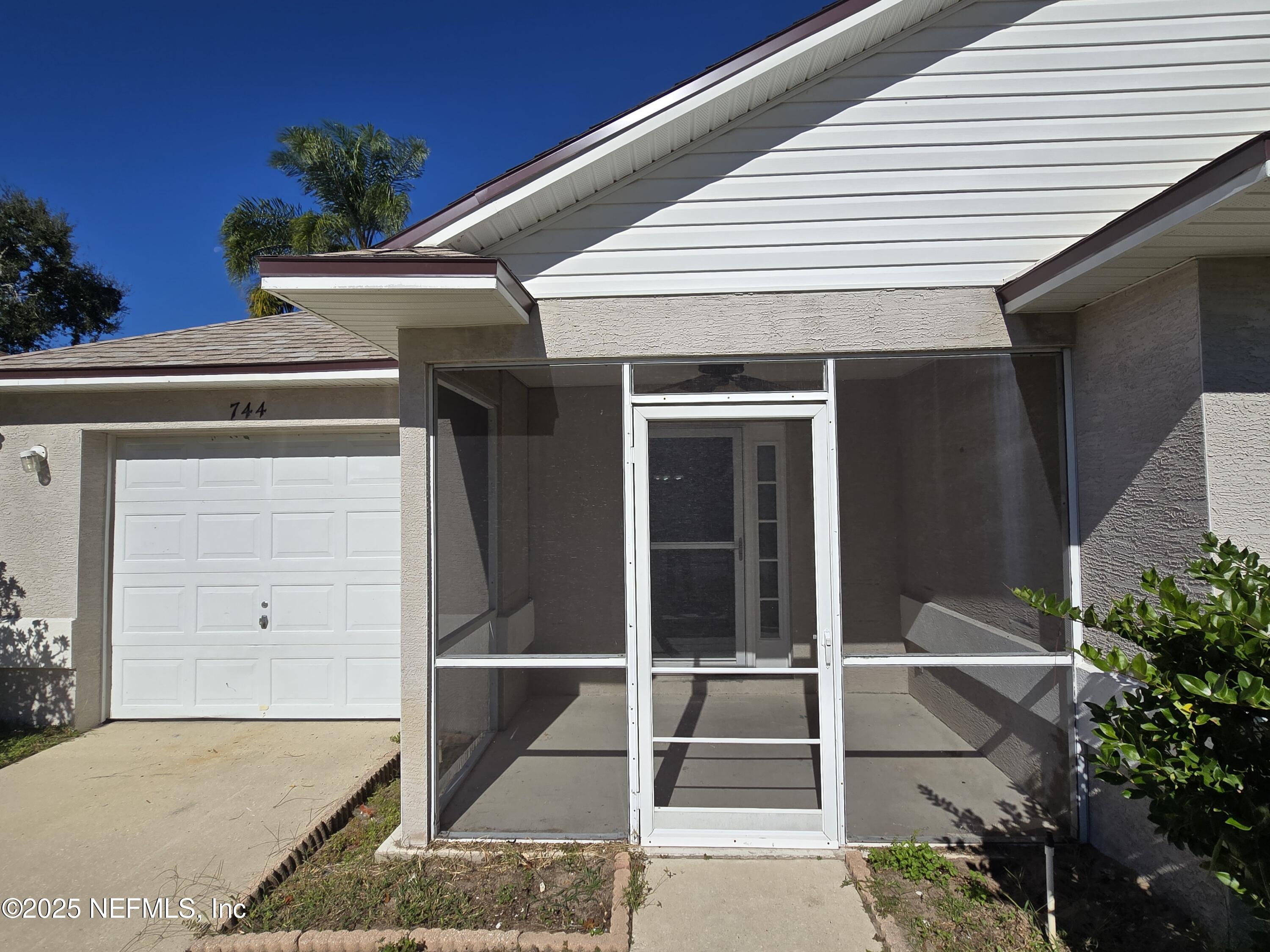 744 Palm Hammock Circle St. Augustine, FL 32095 - Photo 23 of 34 a view of an entrance of the house