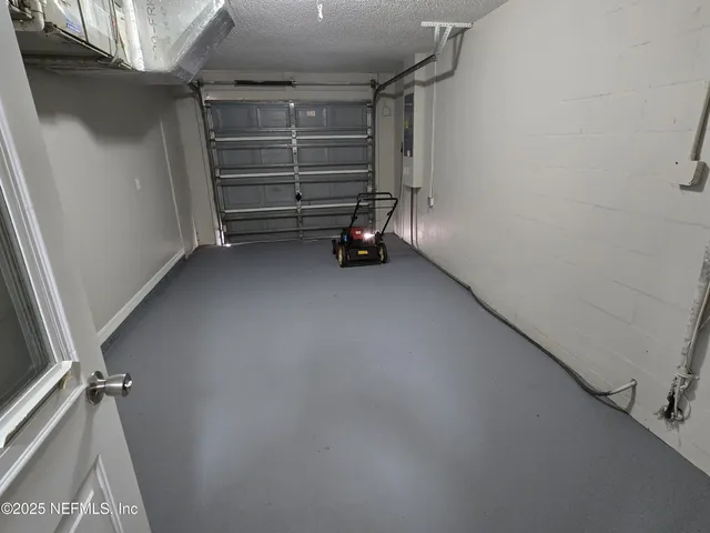 a view of room and racks on the wall