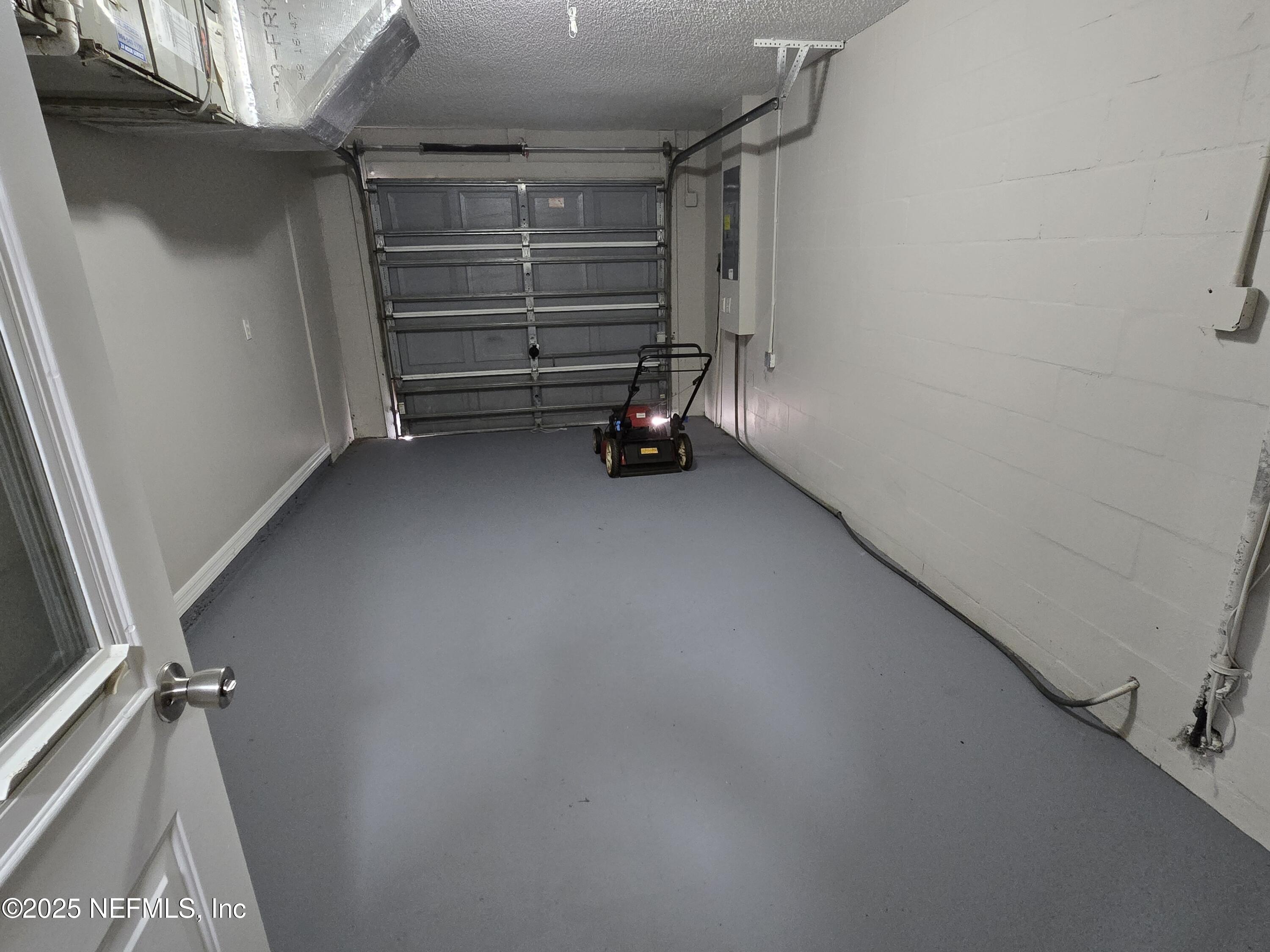 744 Palm Hammock Circle St. Augustine, FL 32095 - Photo 24 of 34 a view of room and racks on the wall