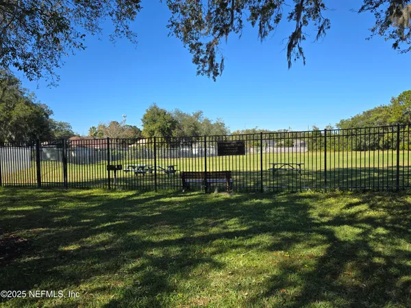 a view of a park with a big yard