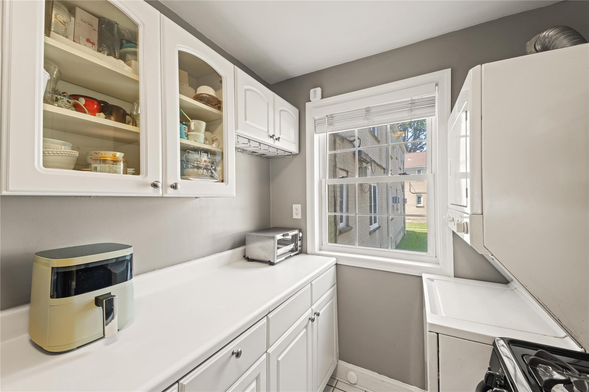 221-03 67th Avenue, Unit 1 Queens, NY 11364 - Photo 9 of 14 a utility room with dryer and washer