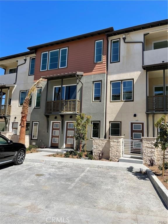 1632 Doheny Way Dana Point, CA 92629 - Photo 26 of 47 a front view of a house with a road