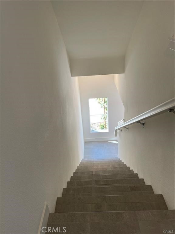 1632 Doheny Way Dana Point, CA 92629 - Photo 6 of 47 a view of an empty room with wooden floor and a window