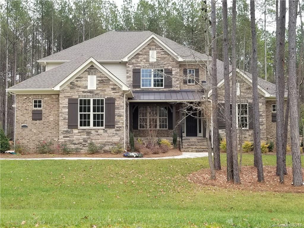 1094 Trinity Ridge Parkway, Unit 51 Fort Mill, SC 29715 - Photo 1 of 17 a front view of a house with garden