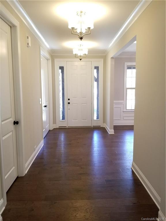 1094 Trinity Ridge Parkway, Unit 51 Fort Mill, SC 29715 - Photo 9 of 17 an empty room with wooden floor and windows