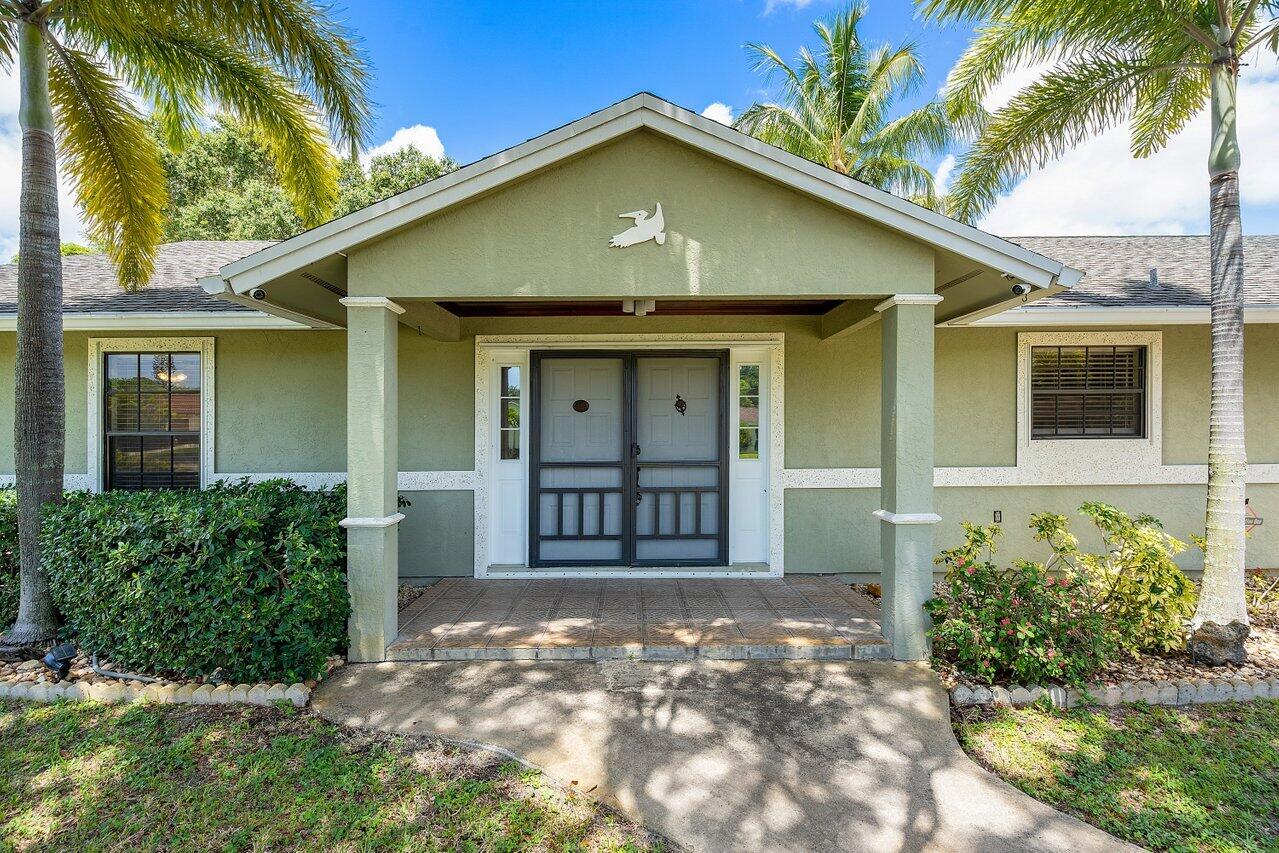 11223 Monet Ridge Road Palm Beach Gardens, FL 33410 - Photo 2 of 30 exterior front