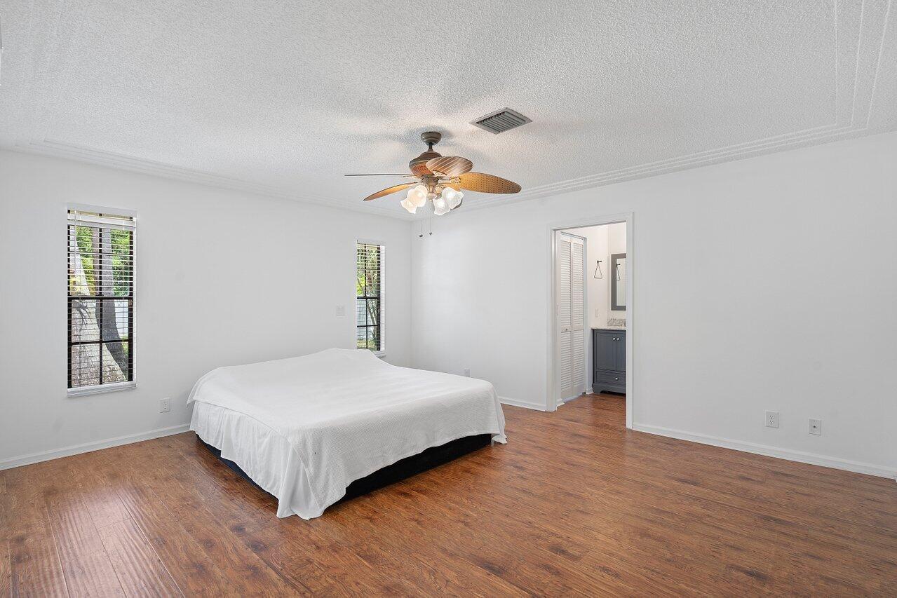 11223 Monet Ridge Road Palm Beach Gardens, FL 33410 - Photo 8 of 30 Primary Bedroom