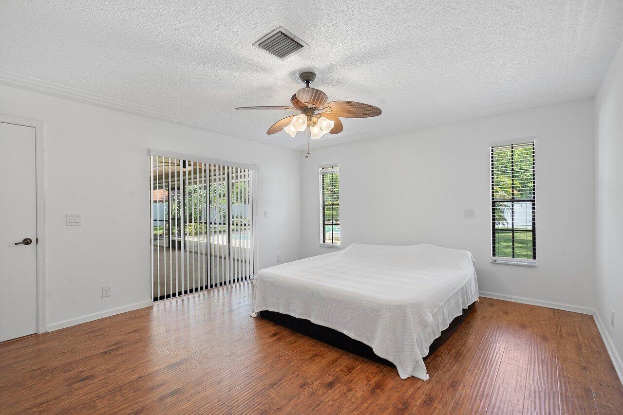 11223 Monet Ridge Road Palm Beach Gardens, FL 33410 - Photo 9 of 30 Primary Bedroom