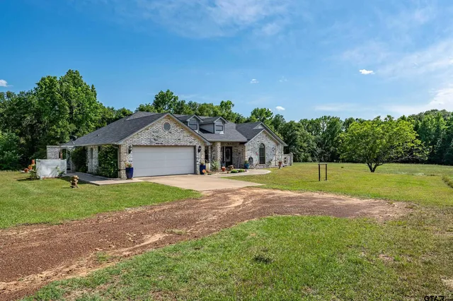 a house view with a outdoor space