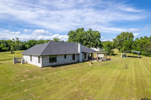 a house with a garden in front of it