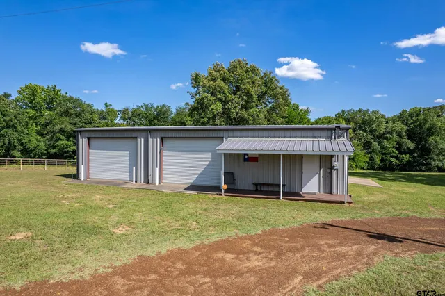a house view with a garden space