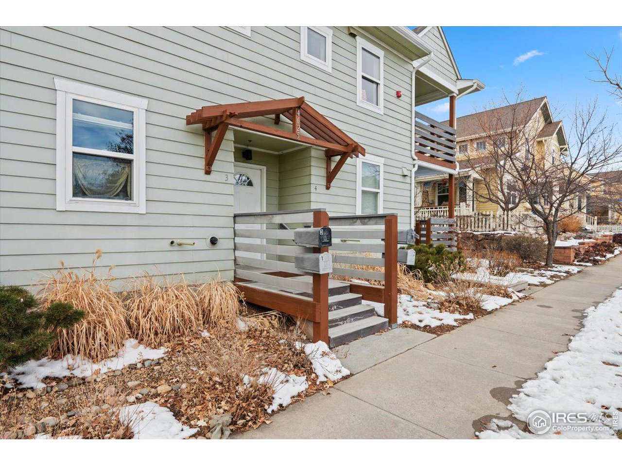 4625 16th Street, Unit 4 Boulder, CO 80304 - Photo 1 of 11 a view of a house with a yard