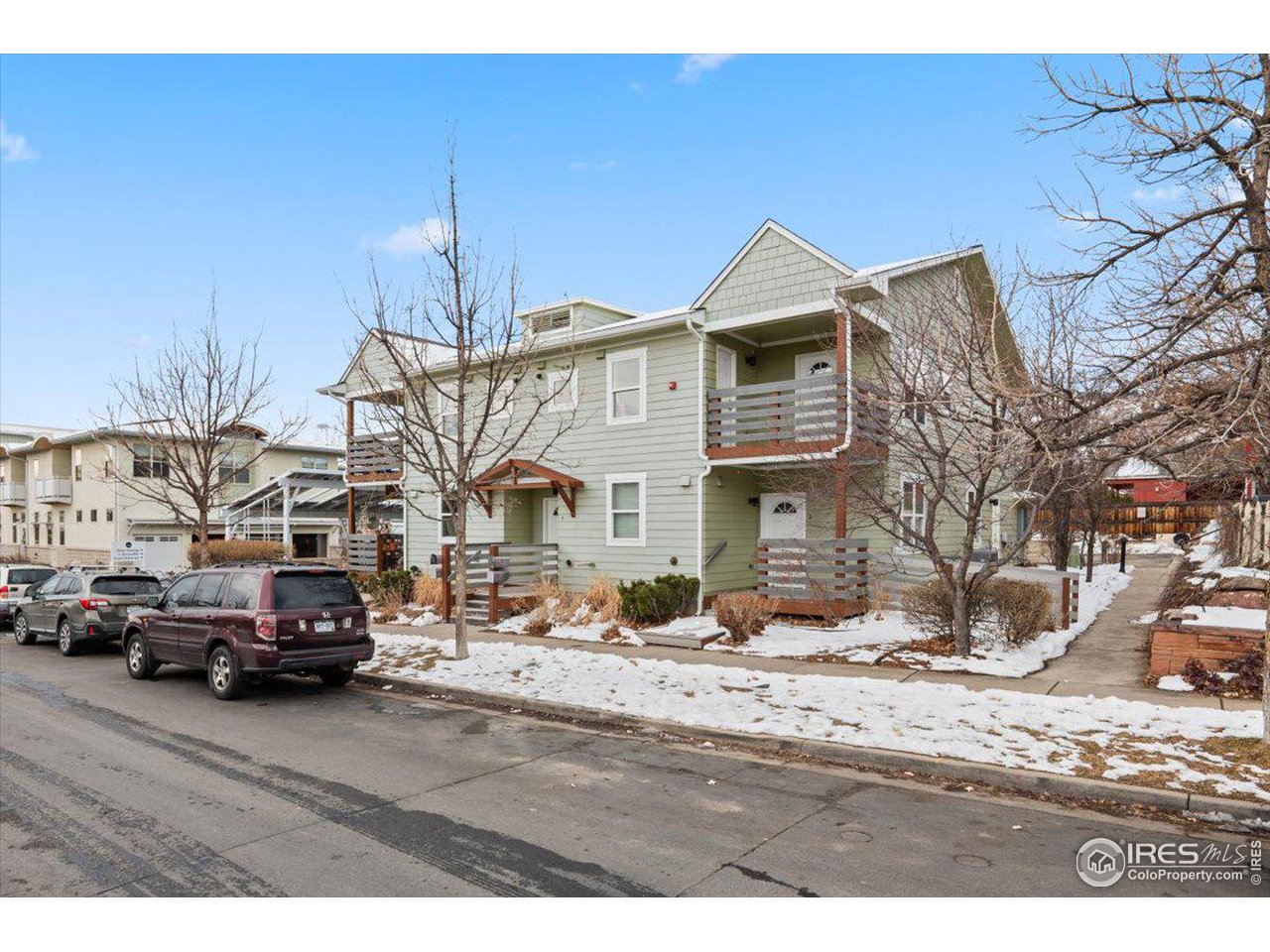 4625 16th Street, Unit 4 Boulder, CO 80304 - Photo 2 of 11 a view of a town with cars parked in front of it