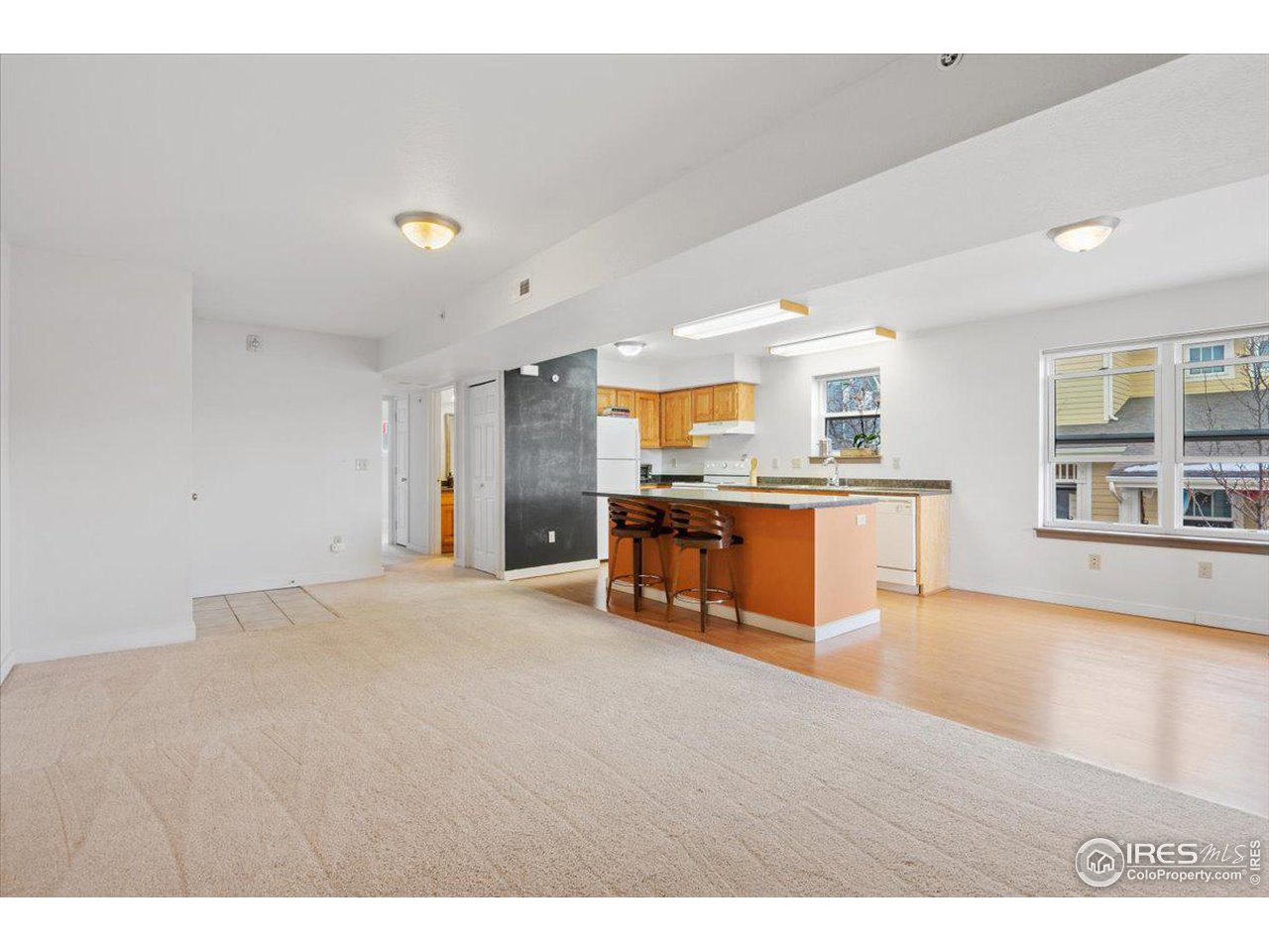 4625 16th Street, Unit 4 Boulder, CO 80304 - Photo 3 of 11 a large kitchen with stainless steel appliances a large window