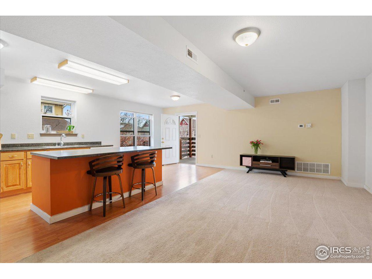 4625 16th Street, Unit 4 Boulder, CO 80304 - Photo 11 of 11 a room with furniture and a wooden floor