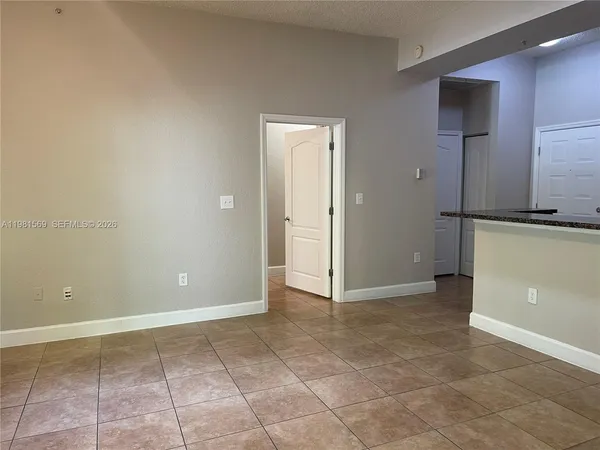 a view of a room that has a window in it