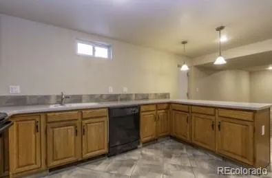 a view of an empty room and a window