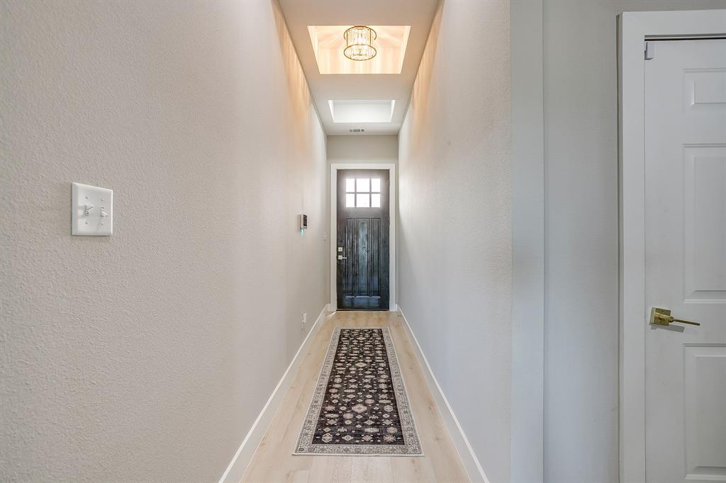 920 Kite Road Mineral Wells, TX 76067 - Photo 3 of 30 a view of a hallway with wooden floor