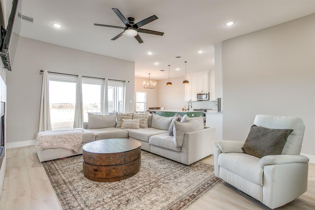 920 Kite Road Mineral Wells, TX 76067 - Photo 6 of 30 a living room with furniture and a large window