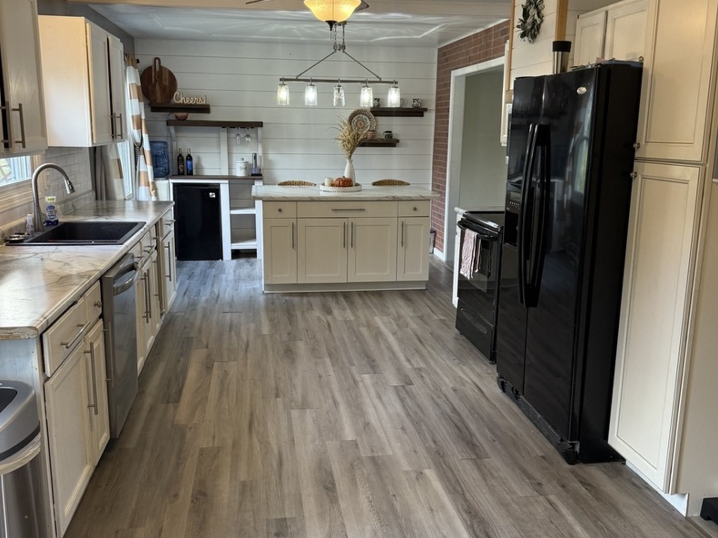 106 Windward Lane Rochelle, IL 61068 - Photo 13 of 42 a kitchen with a sink appliances and cabinets