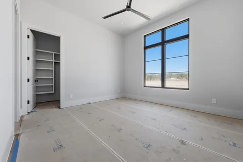 an empty room with windows