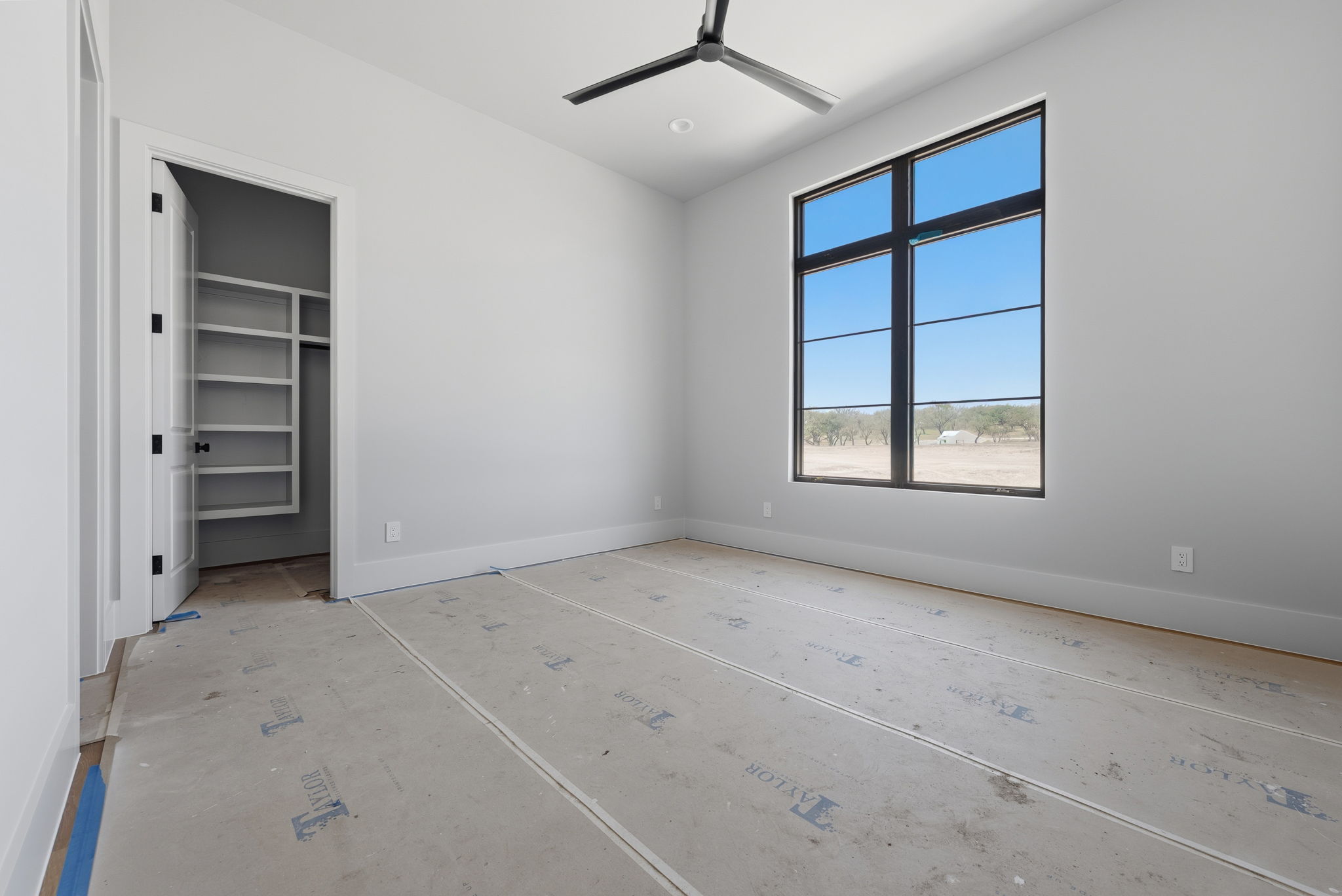 3300 Rm -165 Dripping Springs Dripping Springs, TX 78620 - Photo 22 of 32 an empty room with closet and windows