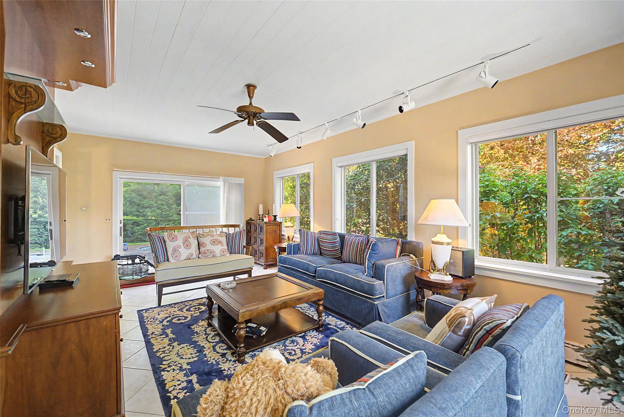 23 Townsend Road Glen Cove, NY 11542 - Photo 10 of 23 a living room with furniture and a large window