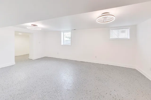 an empty room with windows