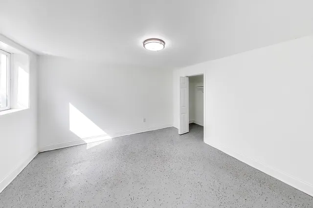 an empty room with a natural light