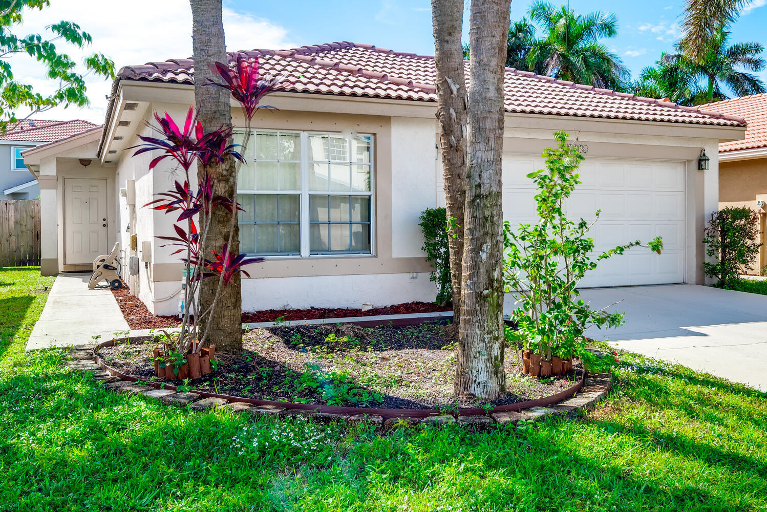 3558 Stratton Lane Boynton Beach, FL 33436 - Photo 2 of 31 Scenic Front Entrance of the Home
