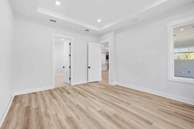 a view of an empty room and window