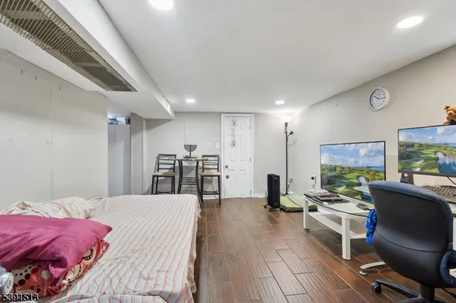 a large bedroom with furniture