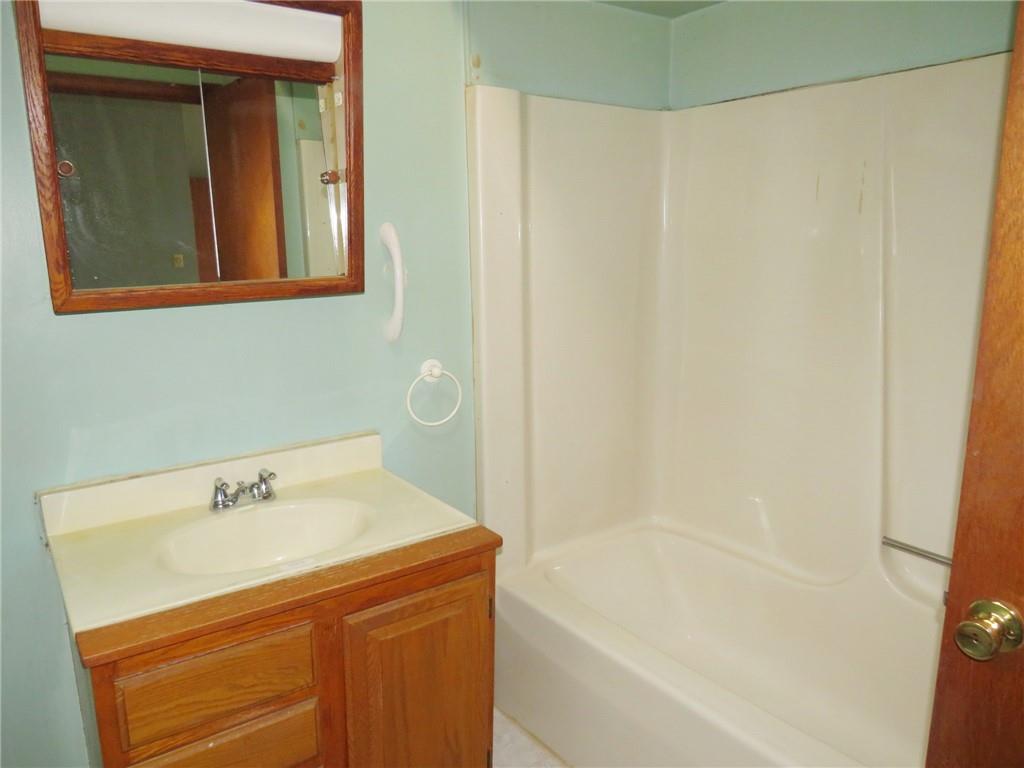 236 Francis Road Pittsburgh, PA 15239 - Photo 9 of 14 a bathroom with a bathtub and a sink