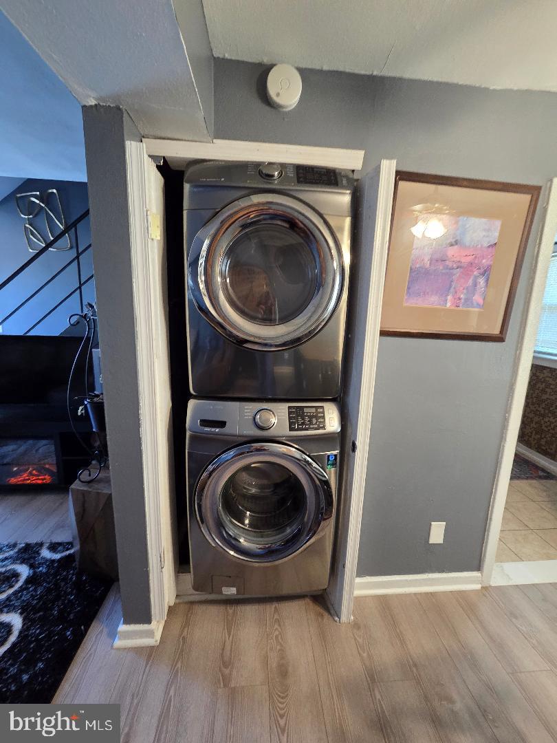 2754 Iverson Street, Unit 72 Temple Hills, MD 20748 - Photo 15 of 17 a view of a hallway with washer and dryer