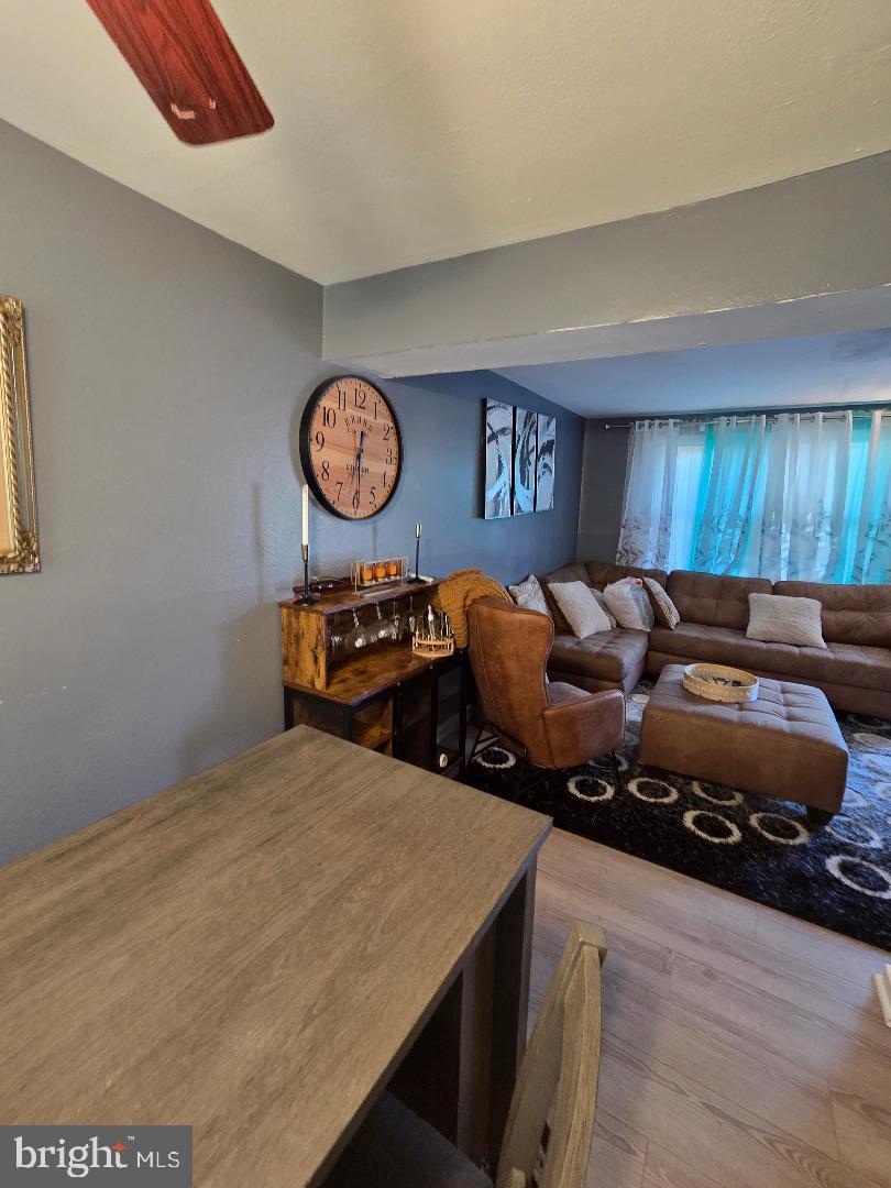 2754 Iverson Street, Unit 72 Temple Hills, MD 20748 - Photo 10 of 17 a bed room with a bed and a lamp