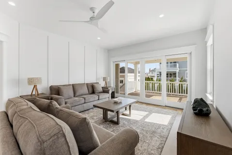 a view of a house with backyard and porch