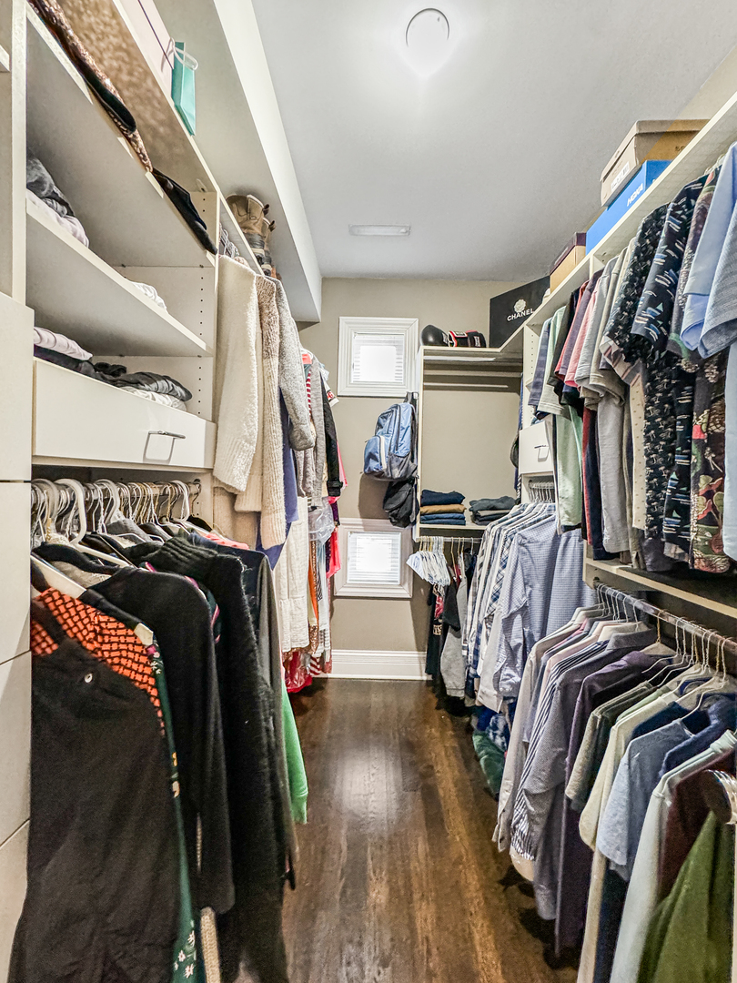 2224 North Wayne Avenue Chicago, IL 60614 - Photo 22 of 36 a view of walk in closet with clothes and shoes