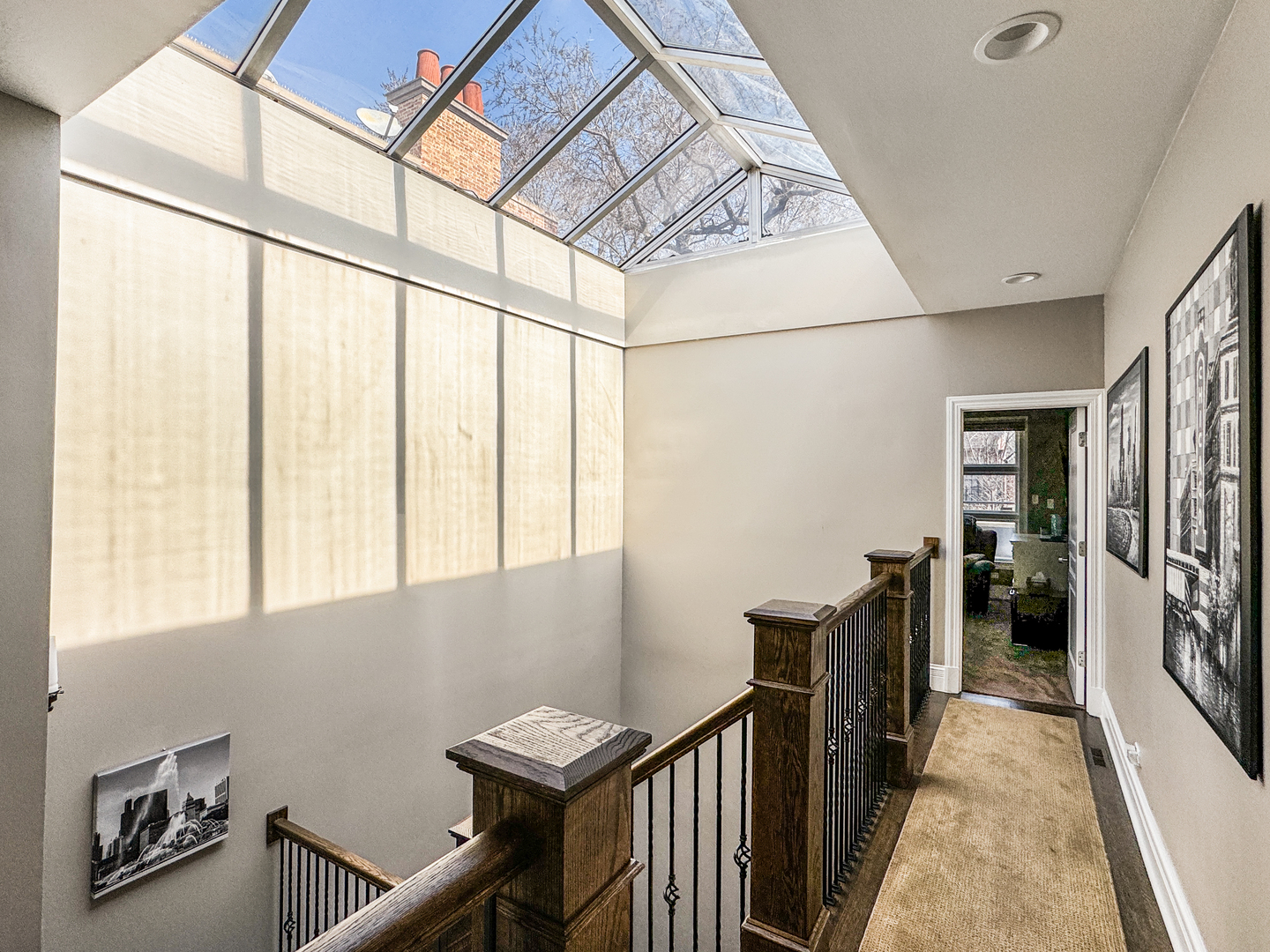 2224 North Wayne Avenue Chicago, IL 60614 - Photo 26 of 36 a view of a hallway with wooden floor and staircase