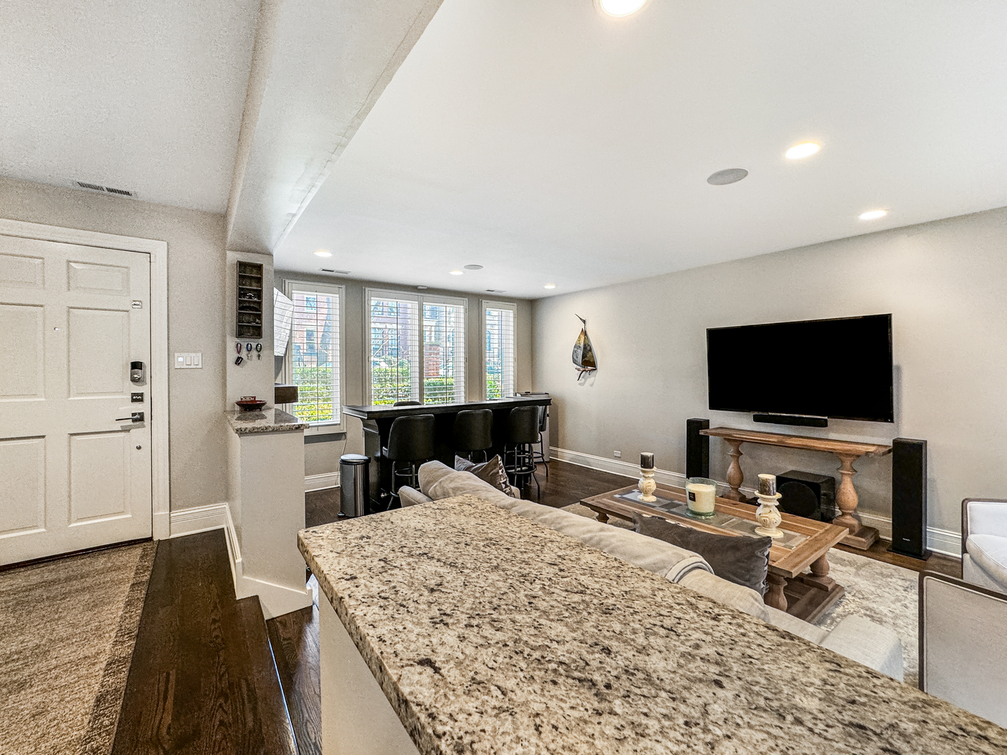 2224 North Wayne Avenue Chicago, IL 60614 - Photo 4 of 36 a living room with furniture and a flat screen tv